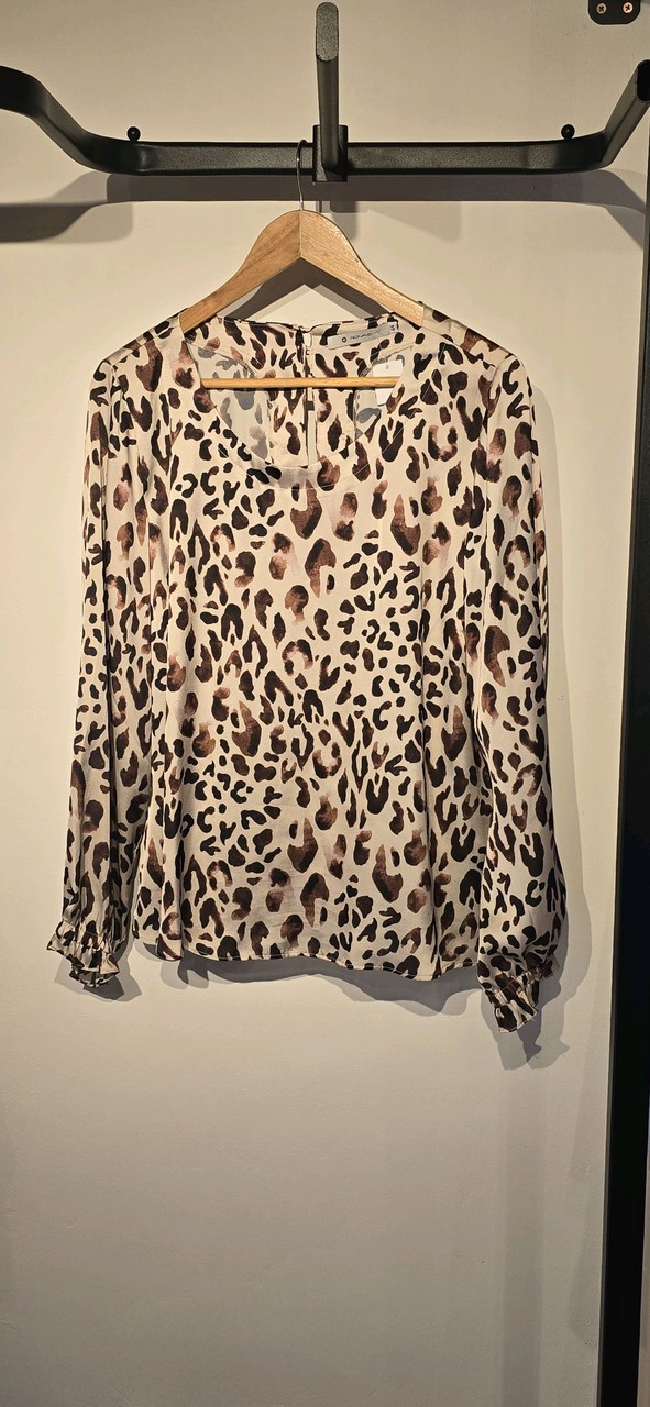 Blusa Animal Print Onça · Estado: Bom