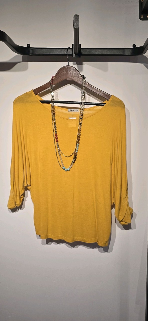 Blusa Morcego Mostarda · Estado: Excelente