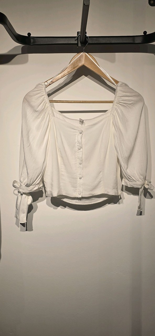 Cropped Manga Bufante Off-White · Estado: Bom