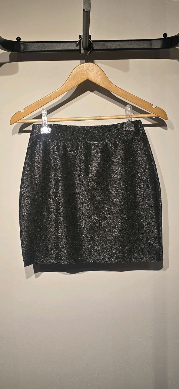 Saia Curta Glitter Preta · Estado: Excelente